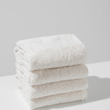Set: large velour towel (90 x 170 cm) and cotton towels in a basket (4 VNT, 30 x 50 cm)