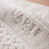 Set: velour bathrobe with shawl collar and cotton bath mat